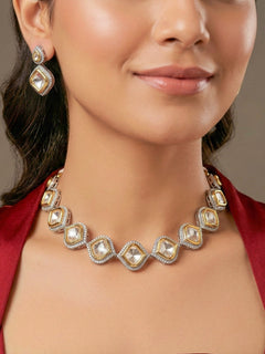 Woman wearing the Susan gold and silver two-tone Kundan and American Diamond necklace set