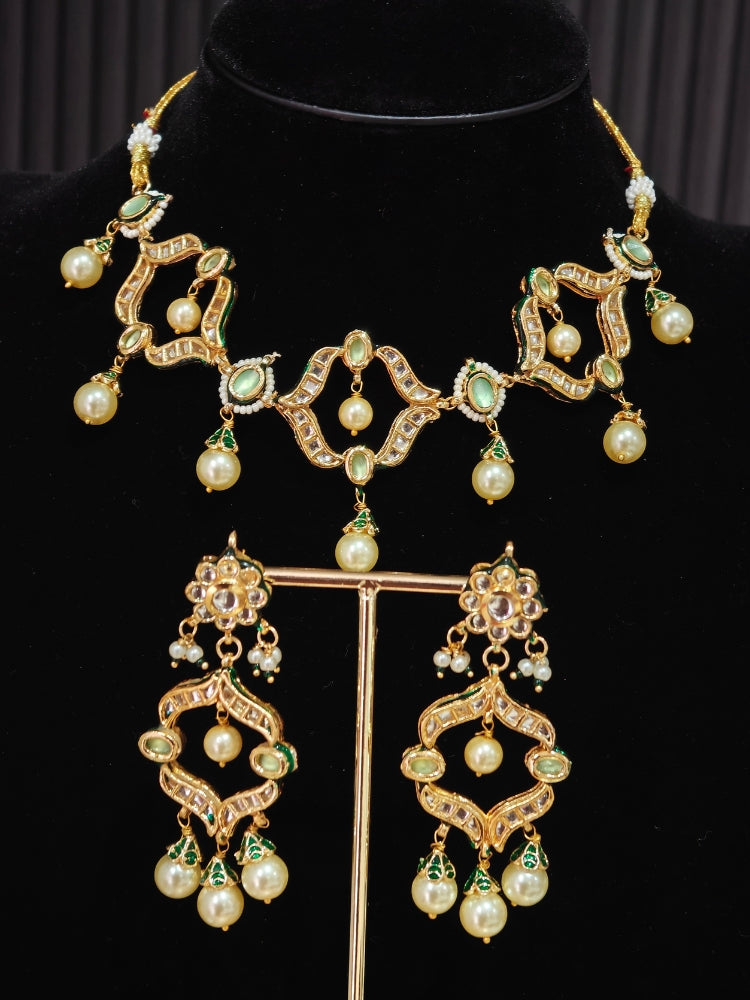 Green Kundan necklace set with mint green stones, pearl drops and matching chandelier earrings