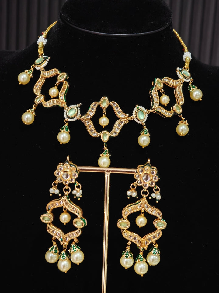 Green Kundan necklace set with mint green stones, pearl drops and matching chandelier earrings