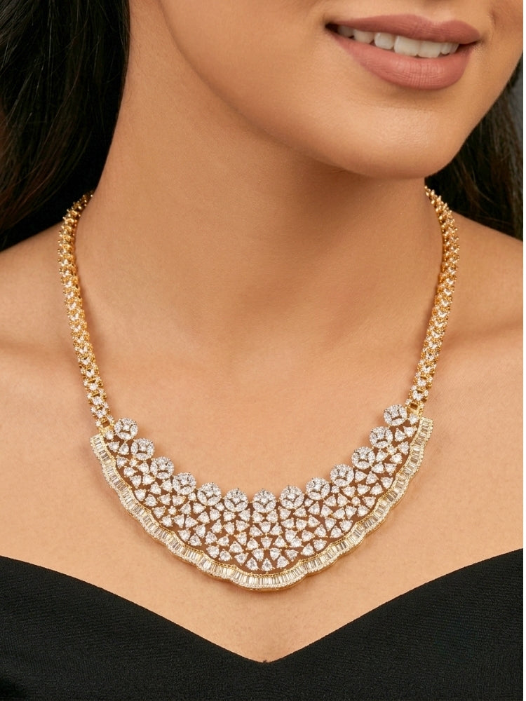 Close-up of a woman wearing an ornate Western (Silver Polish) Collar jewellery set and earrings with American Diamond. Party wear outfit completed with a lightweight American diamond necklace. Reception-ready look featuring a American diamond jewelry set.