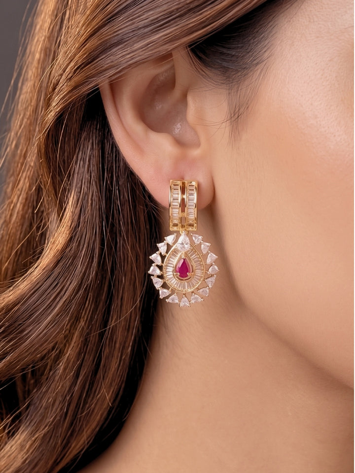 Close-up of a woman wearing an ornate Western (Silver Polish) Pink Collar jewellery set and earrings with Pink Colored Stone and American Diamond.Woman styling a statement American diamond necklace with an off-shoulder gown for a reception. Party wear outfit completed with a lightweight American diamond necklace.