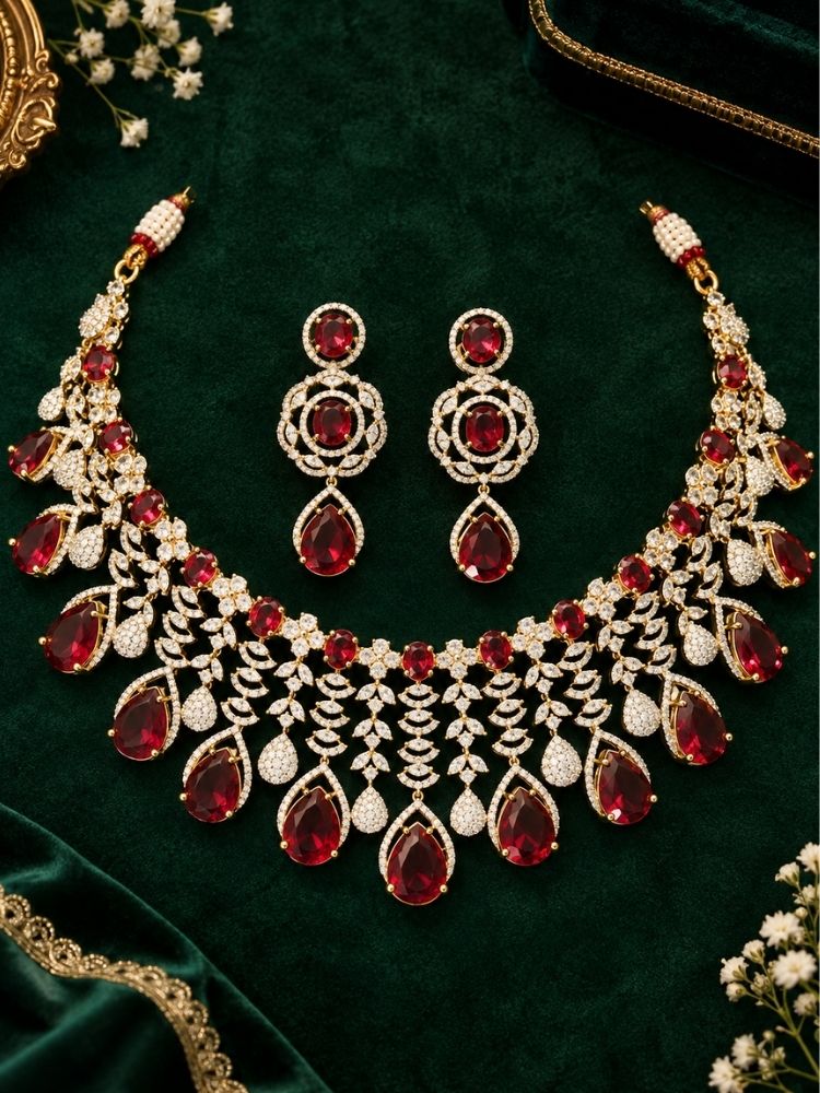 Chantilly Necklace Set on display – a silver-tone American diamond collar necklace with ruby red teardrop stones, with matching earrings, premium artificial jewellery online