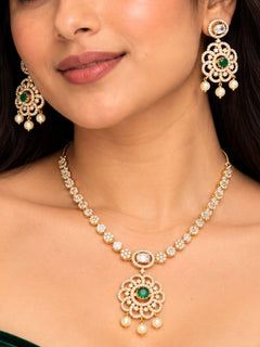 Coco Colour Changing Necklace Set – woman wearing a gold-tone American diamond necklace with interchangeable colour stone pendant and matching earrings