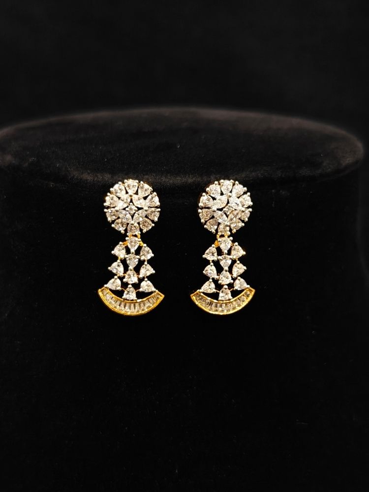 Close-up of  an ornate Western (Silver Polish) Collar jewellery set and earrings with American Diamond. Party wear outfit completed with a lightweight American diamond necklace. Reception-ready look featuring a American diamond jewelry set.