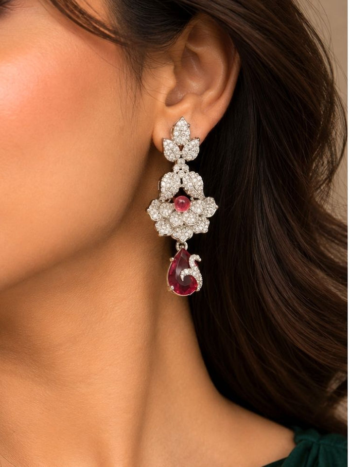 Oleander American Diamond Red Silver Tone earrings close-up – silver American diamond floral drop earrings with red stones, matching the necklace set