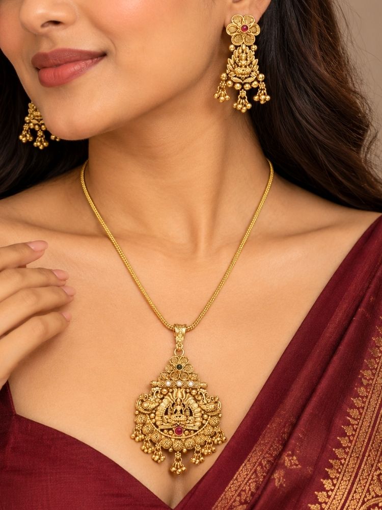 Shree Pendant Set worn with a maroon saree – gold temple-style pendant necklace for women, traditional artificial jewellery