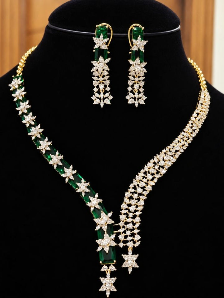 Electra Green Necklace Set with earrings – a silver-tone American diamond necklace with emerald green stones and asymmetric drops, jewellery set to buy online