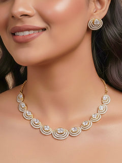 Close-up of a woman wearing an ornate Indo-western American Diamond gold Collar jewellery set and earrings with American Diamond and Monalisa Stones. Close-up of a cocktail party look featuring a premium American diamond necklace.
Festive celebration look featuring an American Diamond artificial necklace.