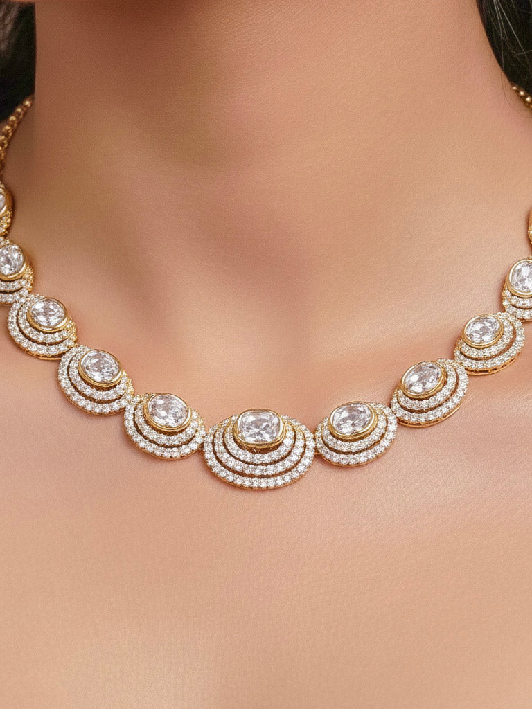 Close-up of a woman wearing an ornate Indo-western American Diamond gold Collar jewellery set and earrings with American Diamond and Monalisa Stones. Close-up of a cocktail party look featuring a premium American diamond necklace.
Festive celebration look featuring an American Diamond artificial necklace.