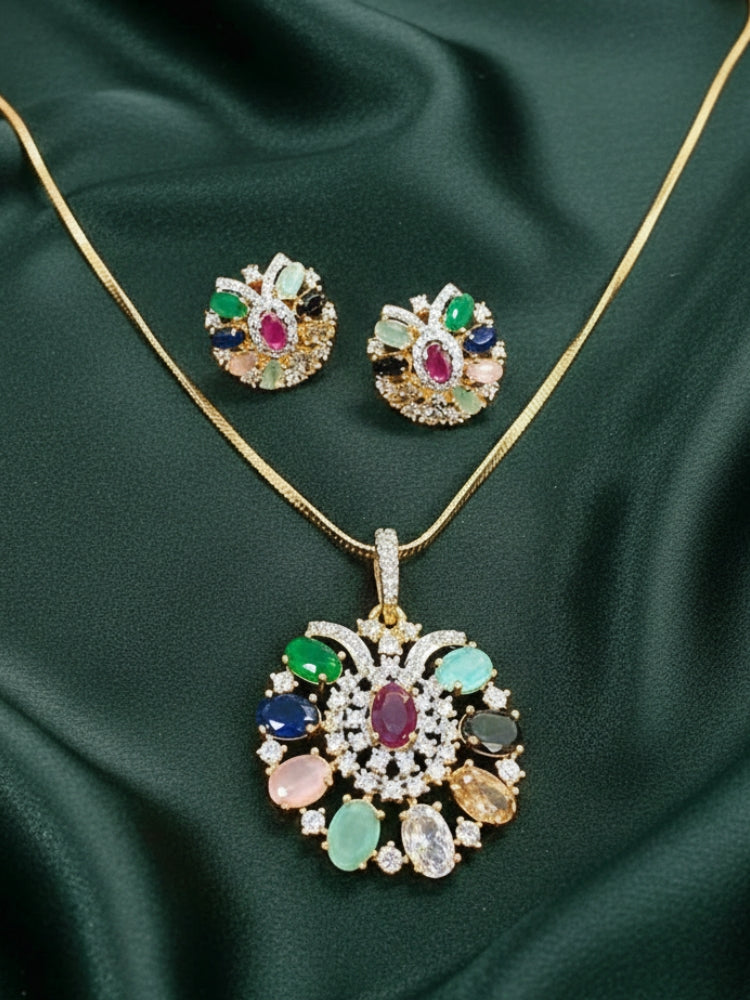 Close-up of an ornate Indo-Western Navratan (gold Polish) Pendant Set with American Diamond and Navratan Colored Stones. Elegant festive look with a high-quality imitation American diamond Pendant set. Indo-western outfit styled with a statement American diamond  Pendant set.