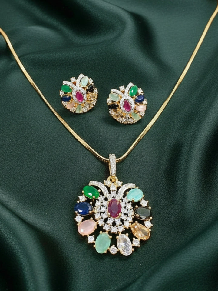 Close-up of an ornate Indo-Western Navratan (gold Polish) Pendant Set with American Diamond and Navratan Colored Stones. Elegant festive look with a high-quality imitation American diamond Pendant set. Indo-western outfit styled with a statement American diamond  Pendant set.