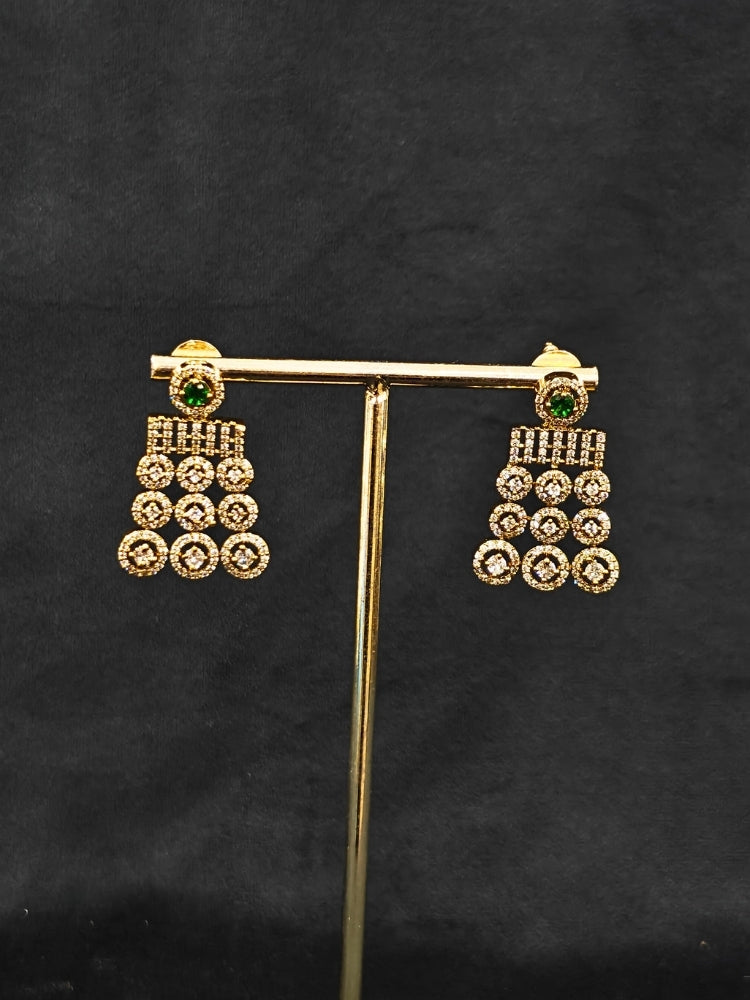 An elegant artificial diamond necklace with green colored stone and matching earrings. This premium artificial diamond jewelry set is perfect for special occasions, from Indian weddings to engagement parties, offering sophisticated glamour without the high price tag.