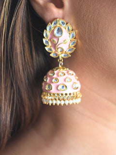Close-up of a woman wearing an ornate traditional Mint Pink Meenakari gold Earrings with Pearls, Kundan and Meenakari. Festive Diwali look styled with premium artificial Meenakari earrings. Close-up of anti-tarnish artificial Meenakari earrings for festive celebrations.