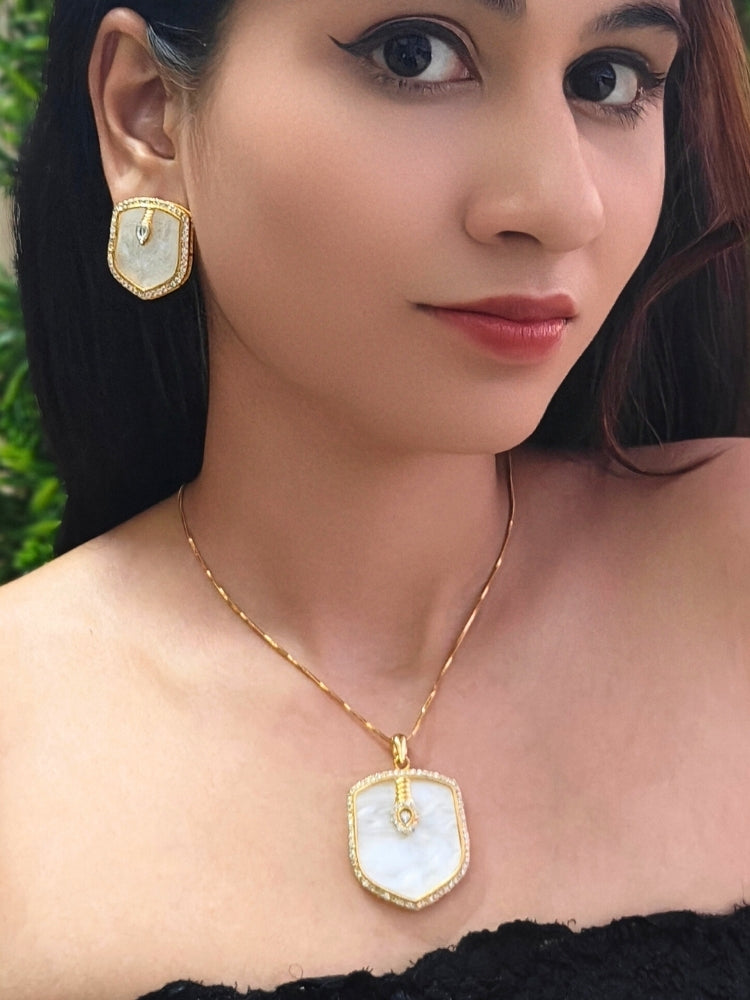 Close-up of a woman wearing an ornate Indo-Western (Gold Polish) White Diamond Pendant Set with American Diamond, Monalisa Stone and Kundan. Festive Diwali outfit styled with an American diamond artificial Pendant. Reception-ready look featuring a statement American diamond Pendant set.