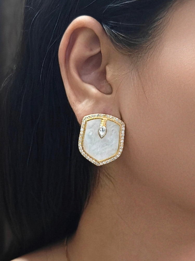 Close-up of a woman wearing an ornate Indo-Western (Gold Polish) White Diamond Pendant Set with American Diamond, Monalisa Stone and Kundan. Festive Diwali outfit styled with an American diamond artificial Pendant. Reception-ready look featuring a statement American diamond Pendant set.