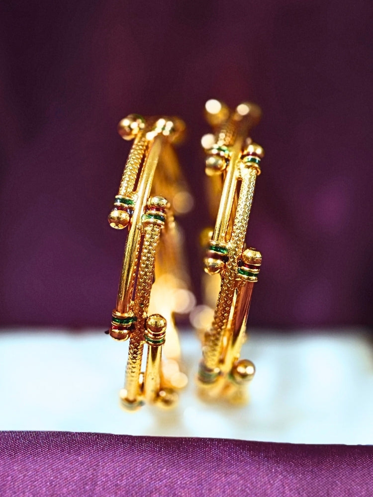 Close-up of an ornate traditional (Gold Polish) White Bangles Set. It’s comfortable and lightweight enough for everyday wear, and it also looks absolutely beautiful and elegant. The design is stylish, the finish is impressive, and it feels really pleasant to wear all day.