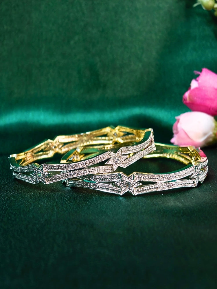 Close-up of an ornate Indo-Western (Gold Polish) Silver Diamond Bangles set with American Diamond. A stacking artificial American Diamond bangles for a festive Diwali celebration. Bridal mehendi outfit styled with luxury artificial American Diamond bangles.
