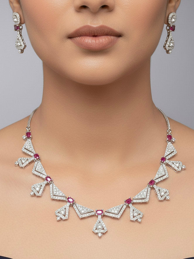 Close-up of a woman wearing a stunning affordable artificial diamond necklace with red colored stone and matching earrings set, perfect for wedding guests and formal events. This luxury artificial diamond jewelry provides the brilliance of real diamonds at a fraction of the cost.