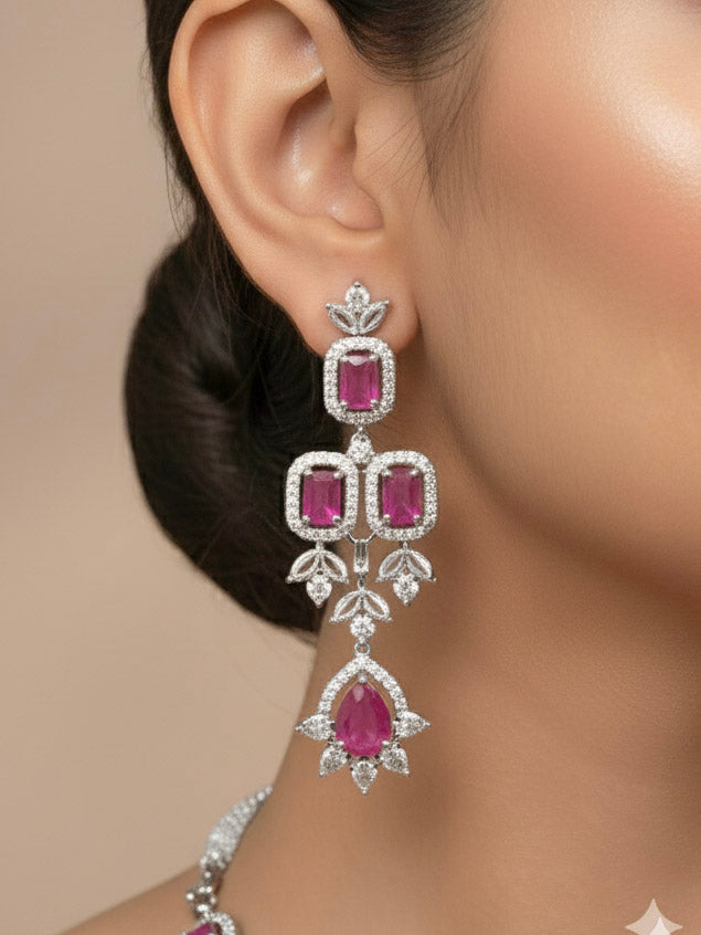 "A stunning woman wearing a glamorous artificial diamond and pink colored stone necklace paired with chic earrings, perfect for bridal wear. This high-quality artificial diamond jewelry set is the ideal choice for modern brides looking for a budget-friendly option with timeless sparkle."
