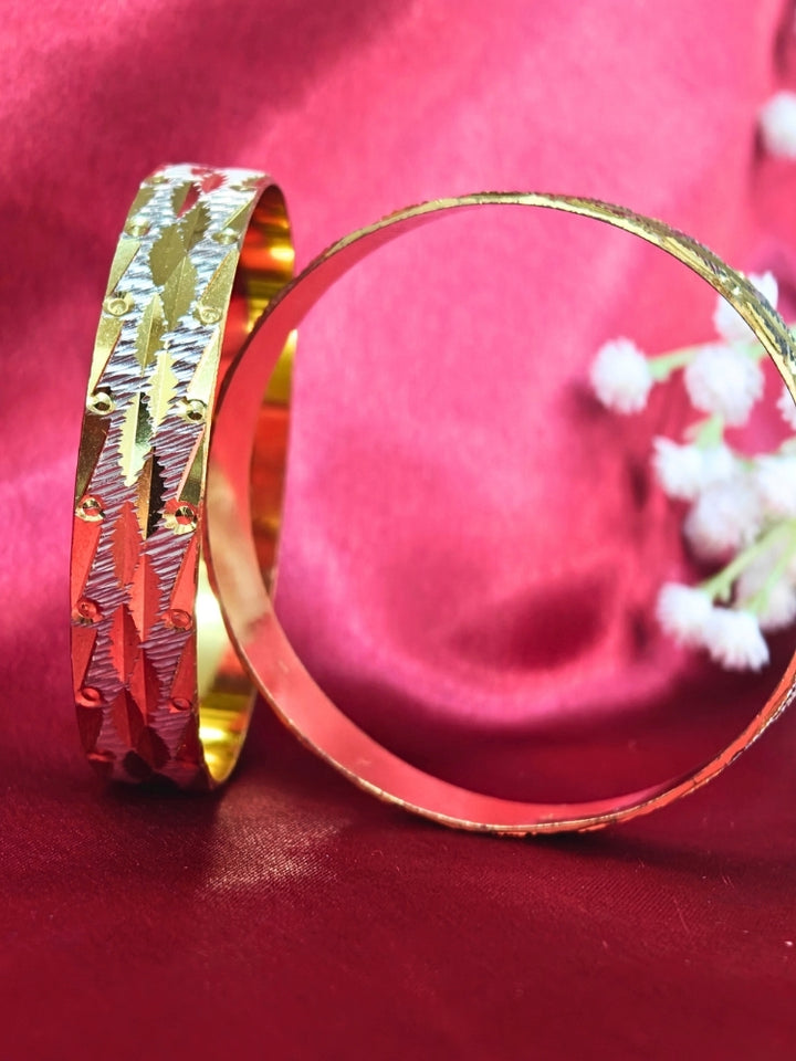 Close-up of an ornate traditional (Gold Polish) Bangles Set. It’s comfortable and lightweight enough for everyday wear, and it also looks absolutely beautiful and elegant. The design is stylish, the finish is impressive, and it feels really pleasant to wear all day.