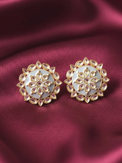 Close-up of an ornate traditional Grey Kundan Studs Earrings with Kundan, Enamel and Meenakari.  Lightweight artificial Kundan Studs earrings for Wedding ceremony. Wearing trendy artificial Kundan Studs earrings for a 2026 Festive celebration in India.