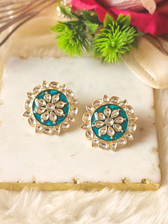 Close-up of an ornate traditional Teel Kundan Studs Earrings with Kundan, Enamel and Meenakari.  Lightweight artificial Kundan Studs earrings for Wedding ceremony. Wearing trendy artificial Kundan Studs earrings for a 2026 Festive celebration in India.