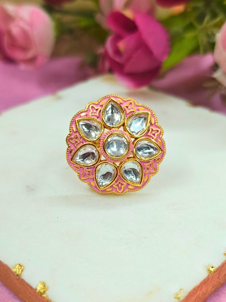 Close-up of an ornate traditional Pink Meenakari gold Ring with Tyaani Kundan and Meenakari. Saree styling inspiration with a Meenakari Ring. Festive celebration look enhanced with traditional Meenakari Ring.