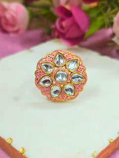 Close-up of an ornate traditional Pink Kundan gold Ring with Tyaani Kundan and Kundan. Saree styling inspiration with a Kundan Ring. Festive celebration look enhanced with traditional Meenakari Ring.