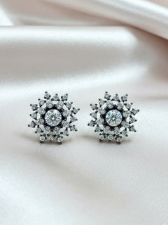 Close-up of an ornate Indo-Western (Black Polish) Diamond Studs Earrings with American Diamond. Indo-western dress styled with lightweight artificial American Diamond studs earrings. Wear in office and everyday.
