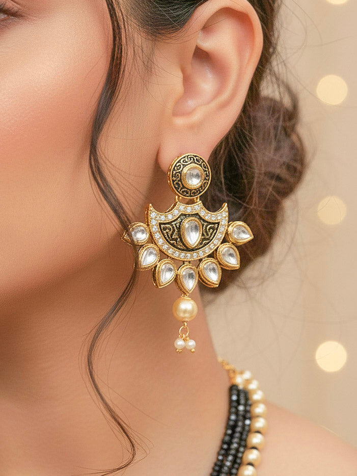 Close-up of a woman wearing an ornate traditional Black Meenakari Long  jewellery set and earrings with Kundan, Meenakari work, crystal beads, pearls and American Diamond. Mehendi ceremony look completed with a Meenakari jewelry set. Woman wearing a vibrant Meenakari artificial jewelry set for celebrations.