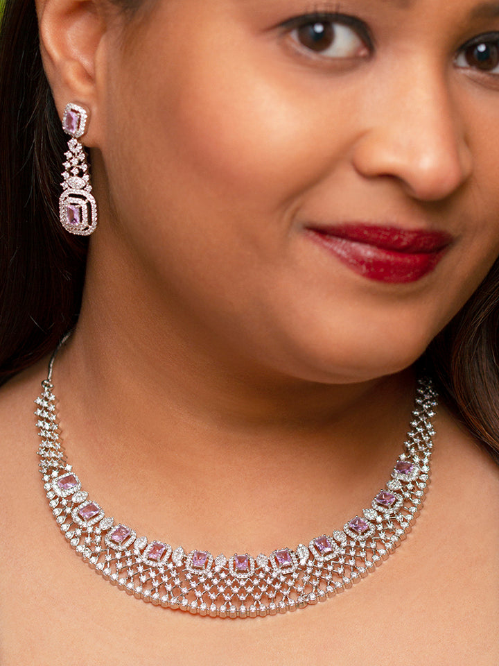 Close-up of a woman wearing a stunning affordable artificial diamond necklace and matching earrings set, perfect for wedding guests and formal events. This luxury artificial diamond jewelry provides the brilliance of real diamonds at a fraction of the cost.