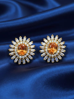 Close-up of a woman wearing an ornate Indo-Western (Gold Polish) Champagne Studs Earrings with American Diamond and Colored Stones. Festive Diwali look styled with premium artificial American Diamond earrings. Indo-western dress styled with lightweight artificial American Diamond earrings.