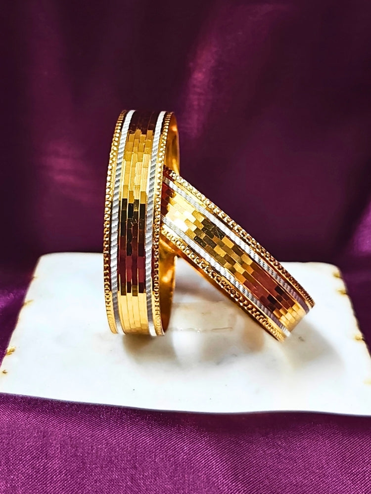 Close-up of an ornate traditional (Gold Polish) Bangles Set. It’s comfortable and lightweight enough for everyday wear, and it also looks absolutely beautiful and elegant. The design is stylish, the finish is impressive, and it feels really pleasant to wear all day.