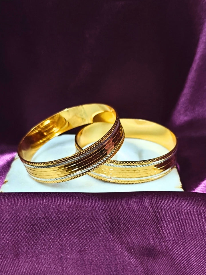 Close-up of an ornate traditional (Gold Polish) Bangles Set. It’s comfortable and lightweight enough for everyday wear, and it also looks absolutely beautiful and elegant. The design is stylish, the finish is impressive, and it feels really pleasant to wear all day.