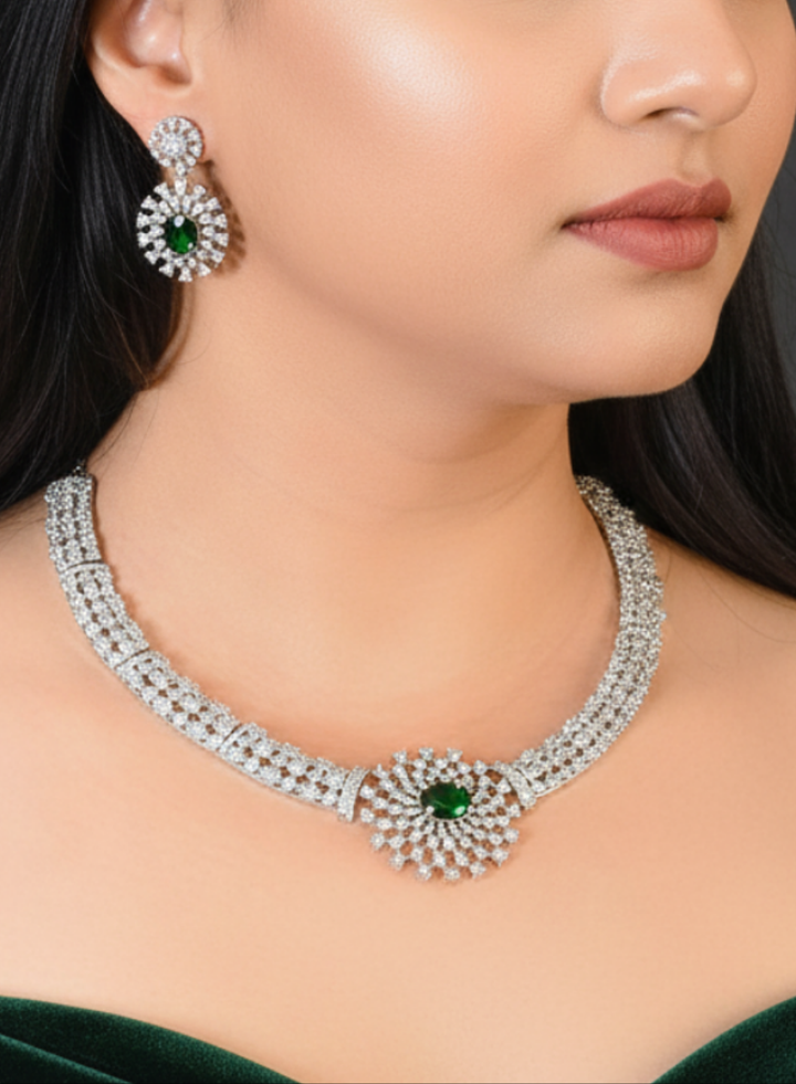 Close-up of a model in luxurious artificial diamond jewelry featuring a designer diamond necklace with emerald green colored stone and earrings set, crafted for bridal fashion and high-end weddings. This beautiful diamond jewelry set offers the brilliance of real diamonds at an affordable price.