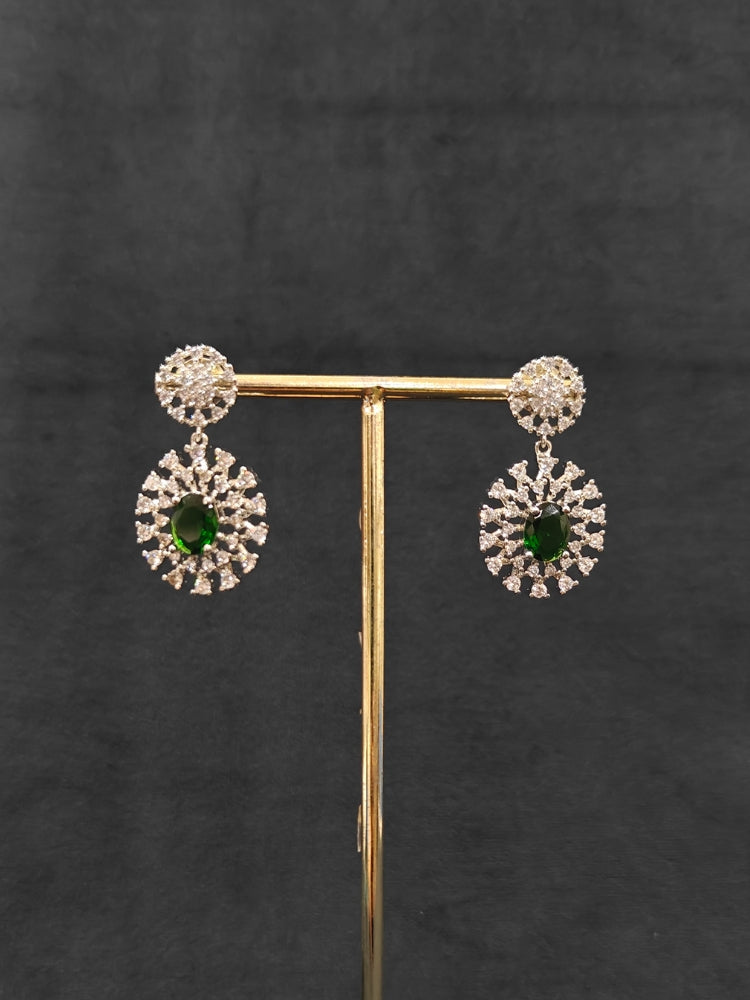 A beautiful artificial diamond necklace with emerald green colored stone and earrings set, ideal for festivals, family gatherings, and special celebrations in India. This elegant diamond jewelry provides the perfect blend of sparkle and tradition, with a modern twist.