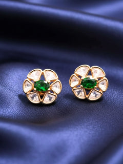 Close-up of an ornate Indo-Western (Rose Gold Polish) Dark Green Studs Earrings with Dark Green Colored Stone and Polki. Indo-western outfit styled with a statement Polki Studs Earrings. Perfect and comfortable for office or everyday use.