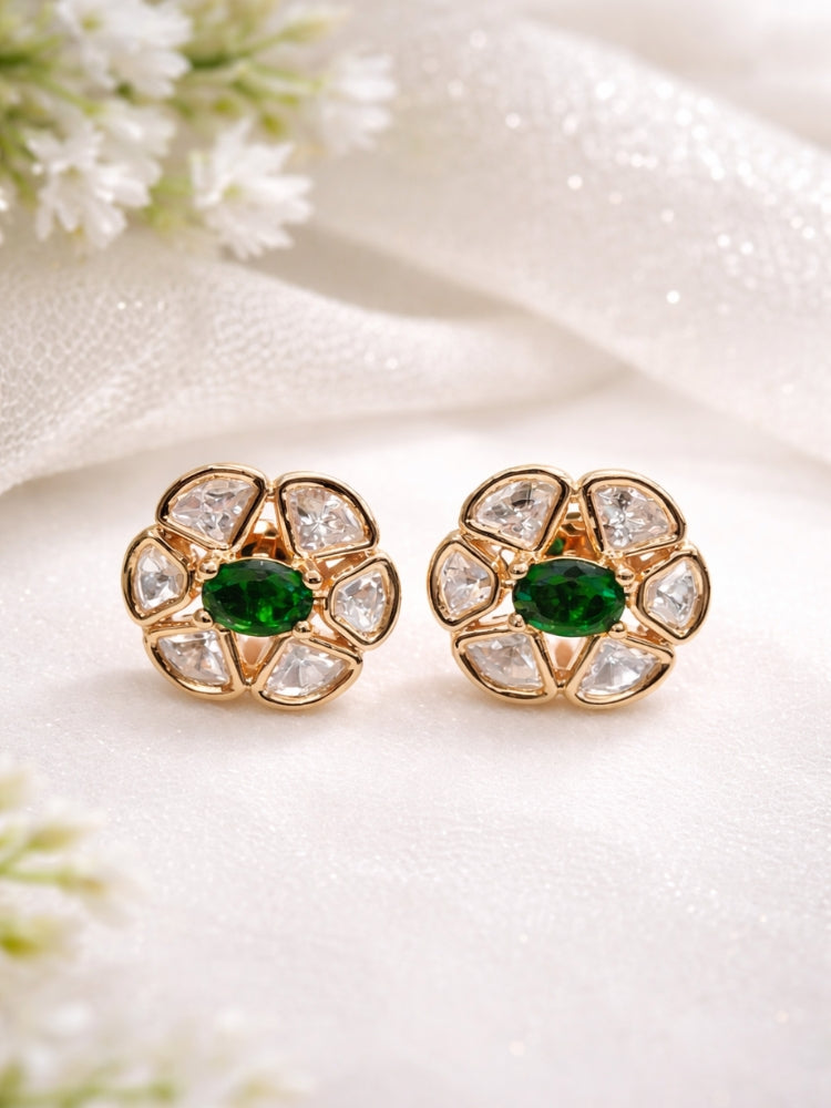Close-up of an ornate Indo-Western (Rose Gold Polish) Dark Green Studs Earrings with Dark Green Colored Stone and Polki. Indo-western outfit styled with a statement Polki Studs Earrings. Perfect and comfortable for office or everyday use.