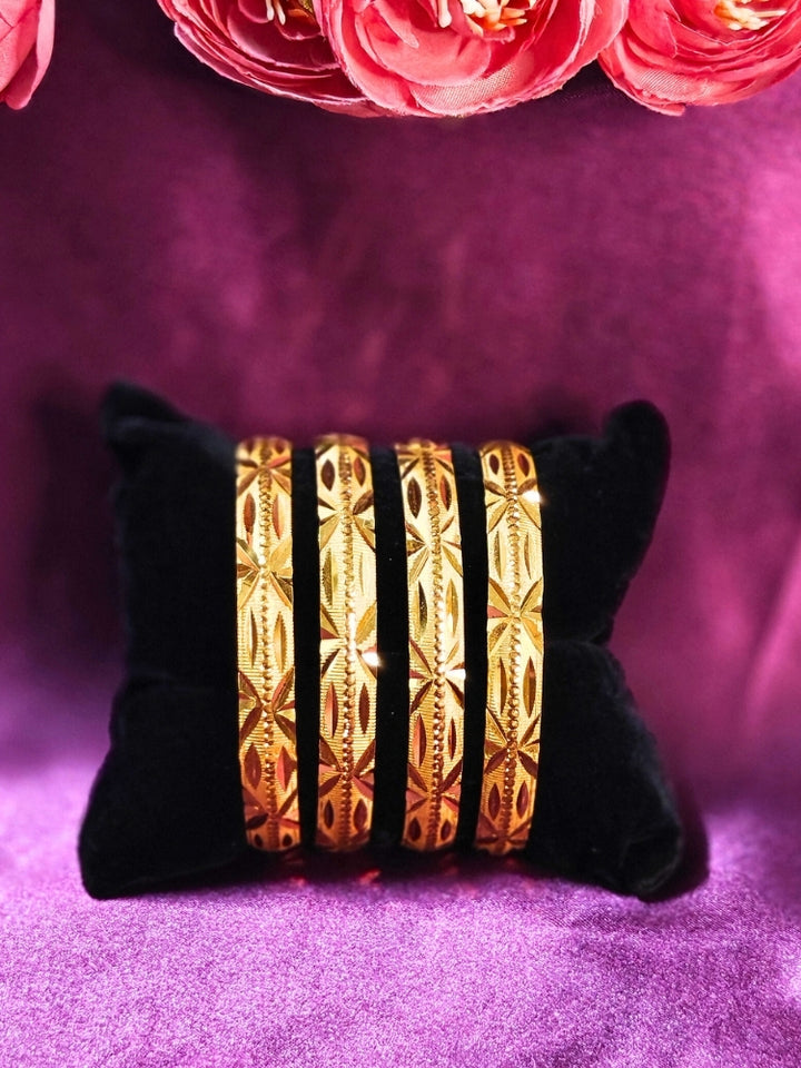 Close-up of an ornate traditional (Gold Polish) Bangles Set. It’s comfortable and lightweight enough for everyday wear, and it also looks absolutely beautiful and elegant. The design is stylish, the finish is impressive, and it feels really pleasant to wear all day.
