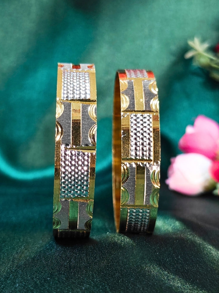 Close-up of an ornate traditional (Gold Polish) Gold & Silver  Bangles Set. It’s comfortable and lightweight enough for everyday wear, and it also looks absolutely beautiful and elegant. The design is stylish, the finish is impressive, and it feels really pleasant to wear all day.
