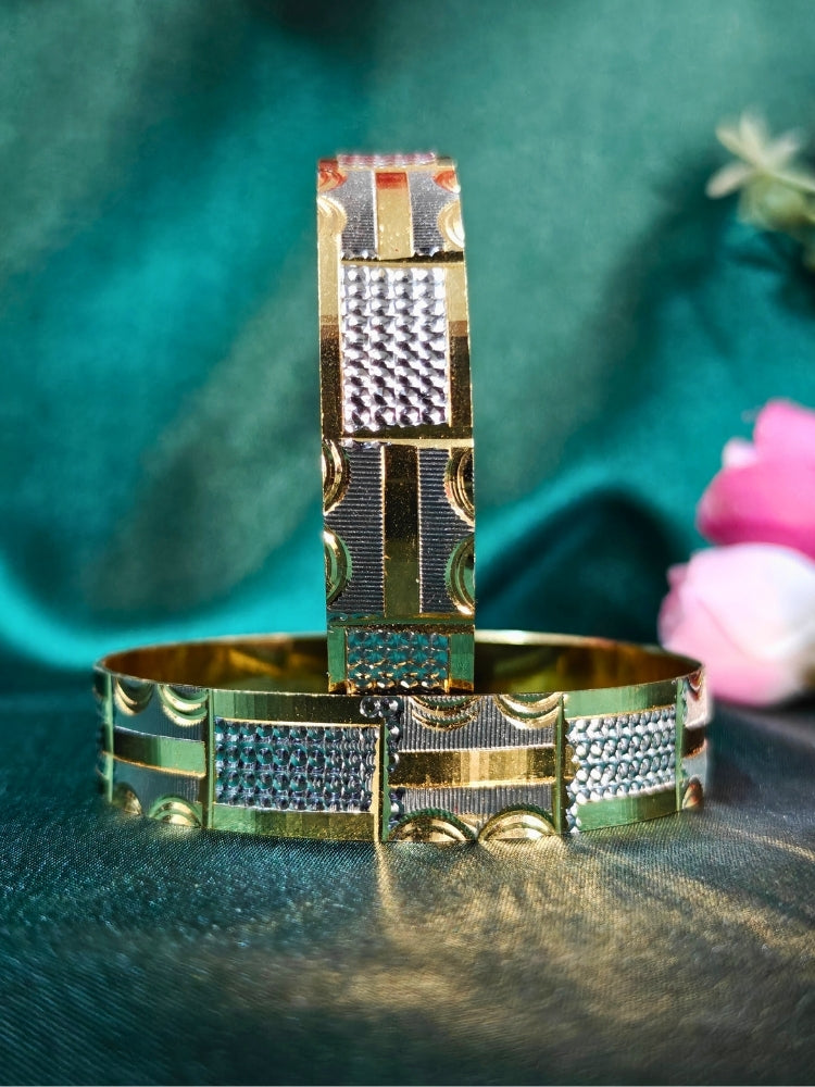 Close-up of an ornate traditional (Gold Polish) Gold & Silver  Bangles Set. It’s comfortable and lightweight enough for everyday wear, and it also looks absolutely beautiful and elegant. The design is stylish, the finish is impressive, and it feels really pleasant to wear all day.