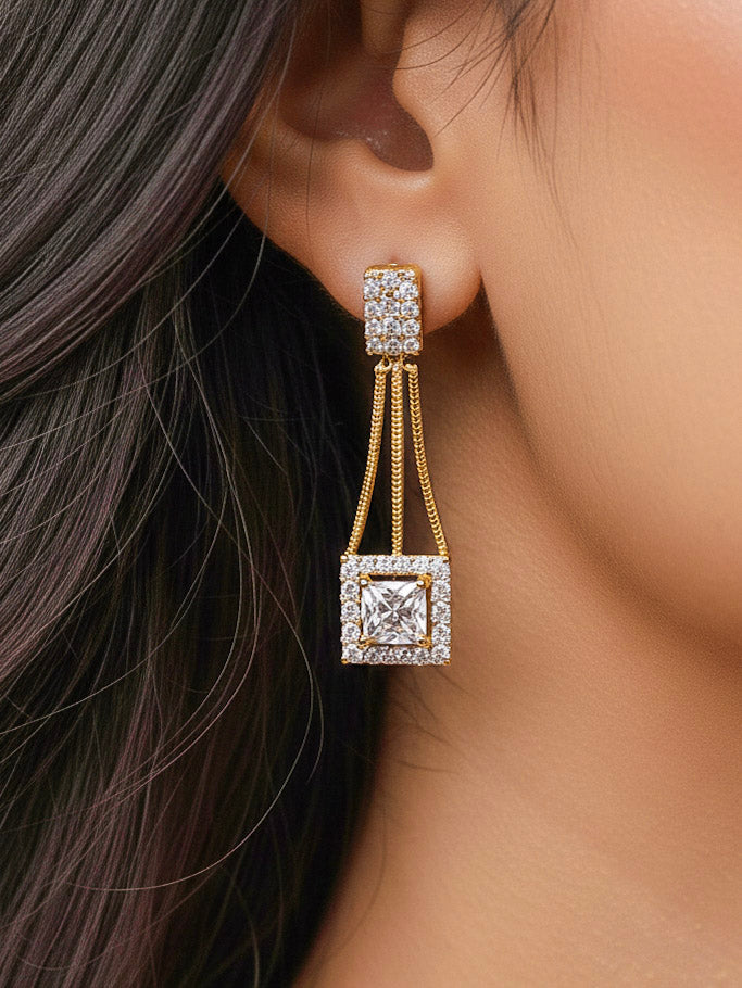 Close-up of a woman wearing an ornate Indo-western white (gold Polish) Collar Layered Diamond jewellery set and earrings with American Diamond. Party wear outfit completed with a lightweight American diamond necklace. Reception-ready look featuring a statement American diamond jewelry set.