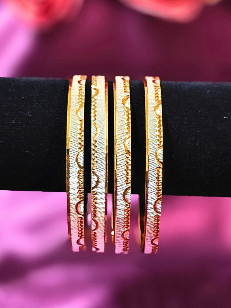 Close-up of an ornate traditional (Gold Polish) Gold & Silver Bangles Set. It’s comfortable and lightweight enough for everyday wear, and it also looks absolutely beautiful and elegant. The design is stylish, the finish is impressive, and it feels really pleasant to wear all day.