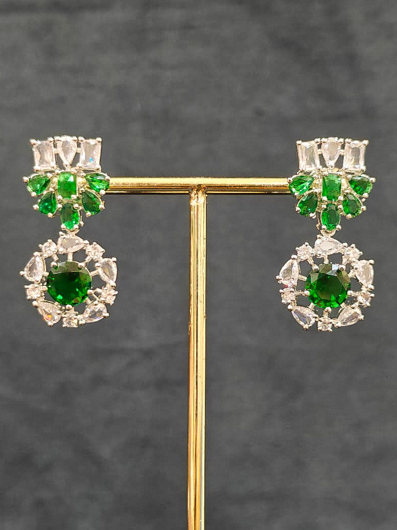 An exquisite artificial diamond necklace with green colored stone and matching earrings, designed for the perfect look. This stunning artificial diamond jewelry set offers luxury and sophistication while being an affordable alternative to natural diamonds.
