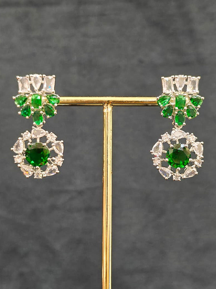An exquisite artificial diamond necklace with green colored stone and matching earrings, designed for the perfect look. This stunning artificial diamond jewelry set offers luxury and sophistication while being an affordable alternative to natural diamonds.