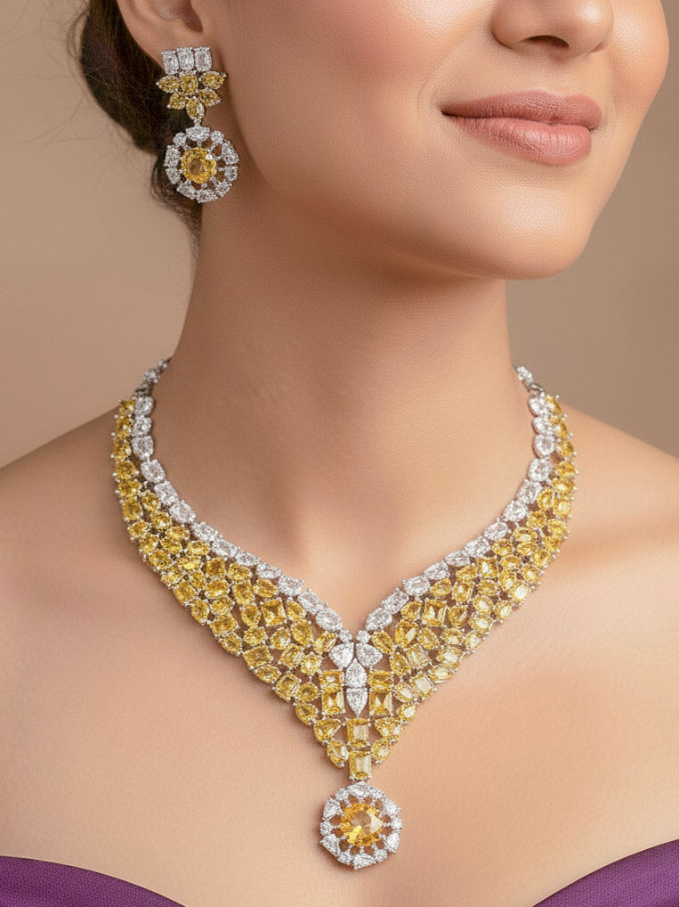 "A bride-to-be wearing an exquisite artificial diamond necklace with yellow colored stone and matching earrings, designed for the perfect engagement look. This stunning artificial diamond jewelry set offers luxury and sophistication while being an affordable alternative to natural diamonds."
