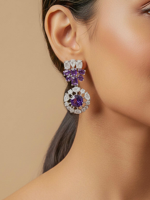 Close-up of a woman wearing an ornate Western Purple Colored Stone Silver Collar jewellery set and earrings with American Diamond and Colored Stones. Woman styling a statement Colored Stones necklace with an off-shoulder gown for a reception and Party.