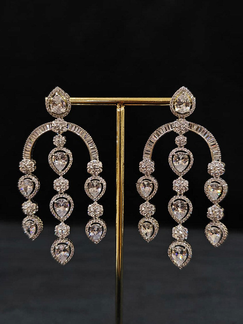 An exquisite artificial diamond necklace and matching earrings, designed for the perfect engagement look. This stunning artificial diamond jewelry set offers luxury and sophistication while being an affordable alternative to natural diamonds.