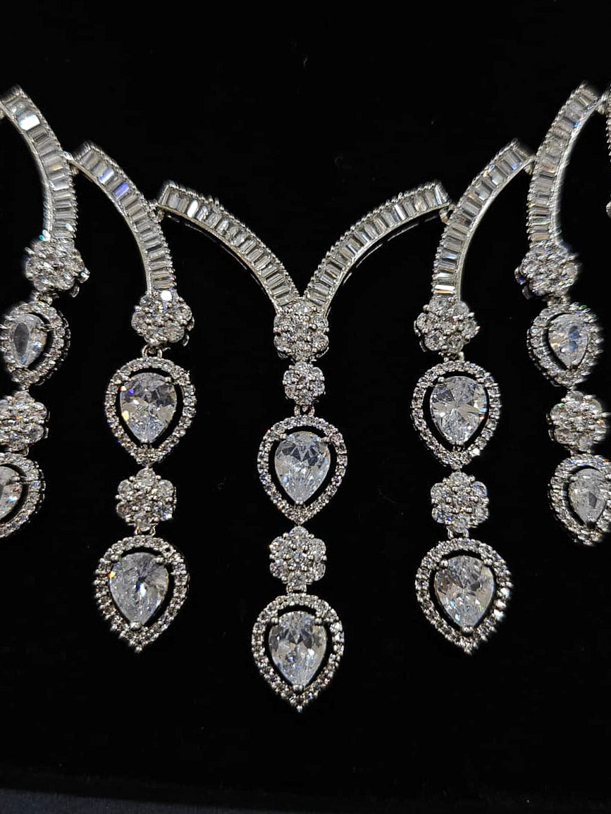 An exquisite artificial diamond necklace and matching earrings, designed for the perfect engagement look. This stunning artificial diamond jewelry set offers luxury and sophistication while being an affordable alternative to natural diamonds.