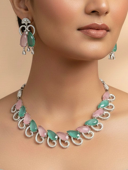 "A bride-to-be wearing an exquisite artificial diamond necklace with colored stone and matching earrings, designed for the perfect engagement look. This stunning artificial diamond jewelry set offers luxury and sophistication while being an affordable alternative to natural diamonds."